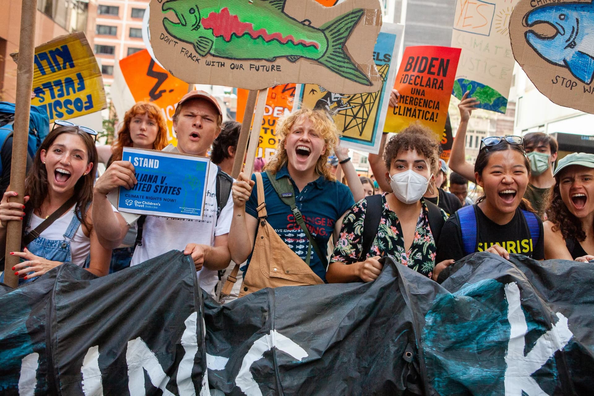 Campus Climate Network organizers leading a march through downtown streets.